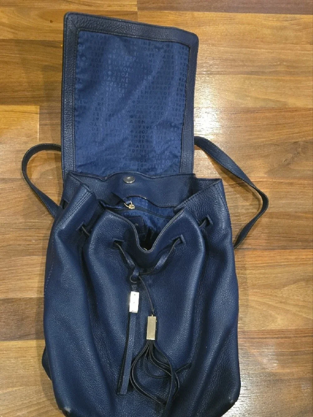 kate spade Navy Leather Drawstring With Gold Accents Backpack